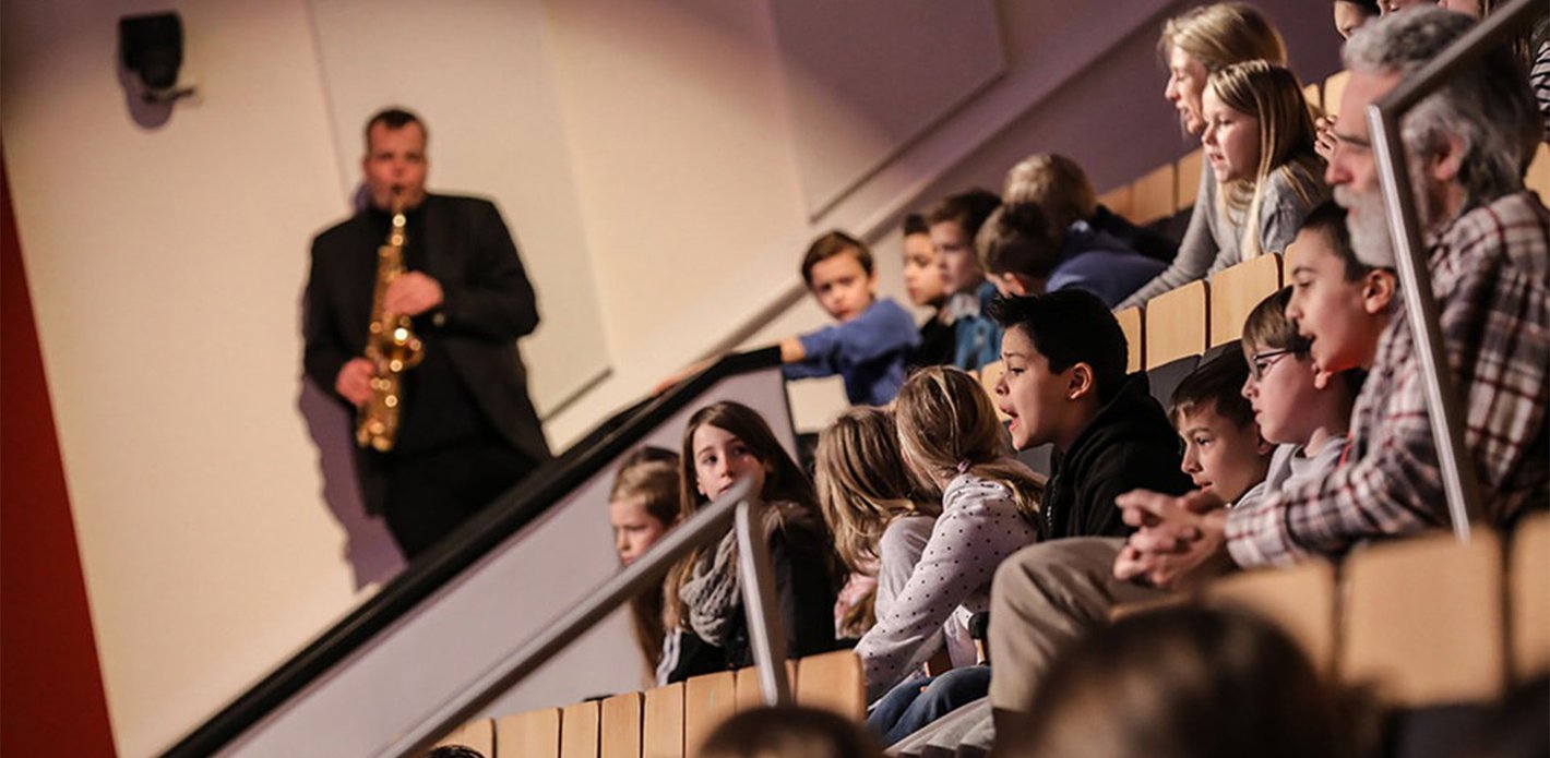 saxophone player Fiete Felsch at a NDR family concert